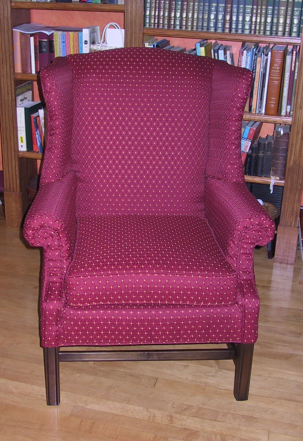 Similar fabric sharpens up this delightful wing chair
