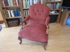 With new velvety fabric, leather buttons and trim, this piece stands proudly in the client's lovely home