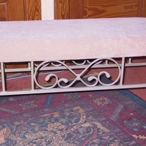 Ecru velour gives this fireside bench a rich, warm feel