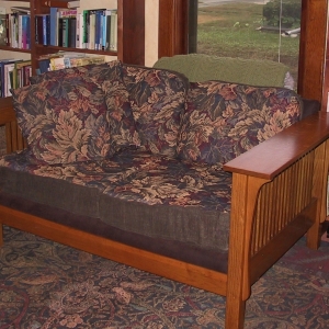 Bold leafy tapestry fabric recalls a William Morris aesthetic