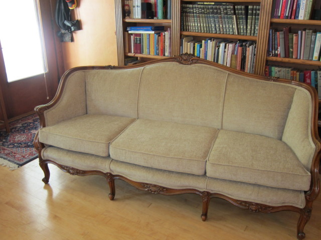 New fabric, new materials and new cushion foam plus  decorative welt and gimp finish the sofa